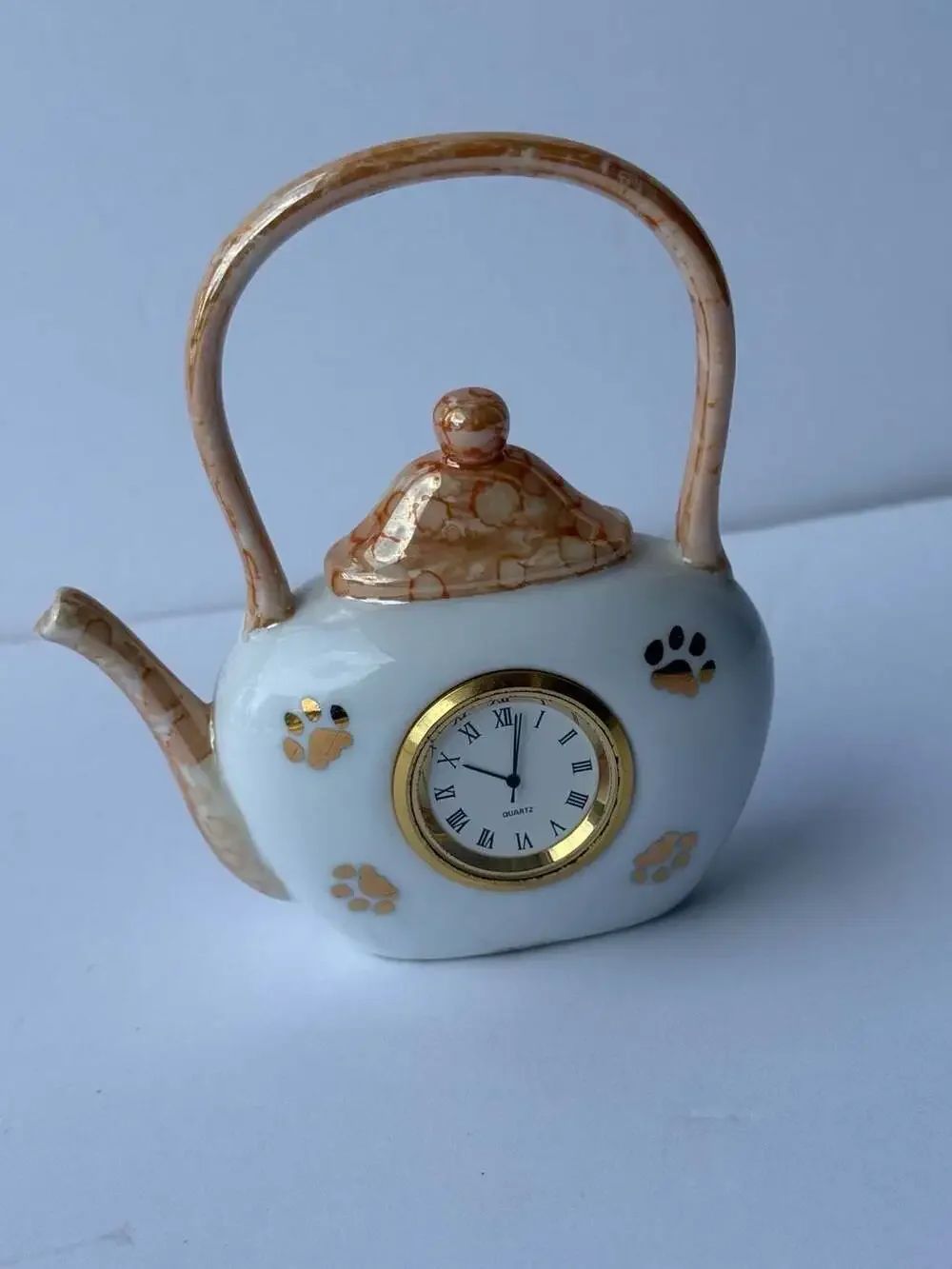 Ceramic Teapot Shaped Quartz Decorative Clock with Paw Print Accents